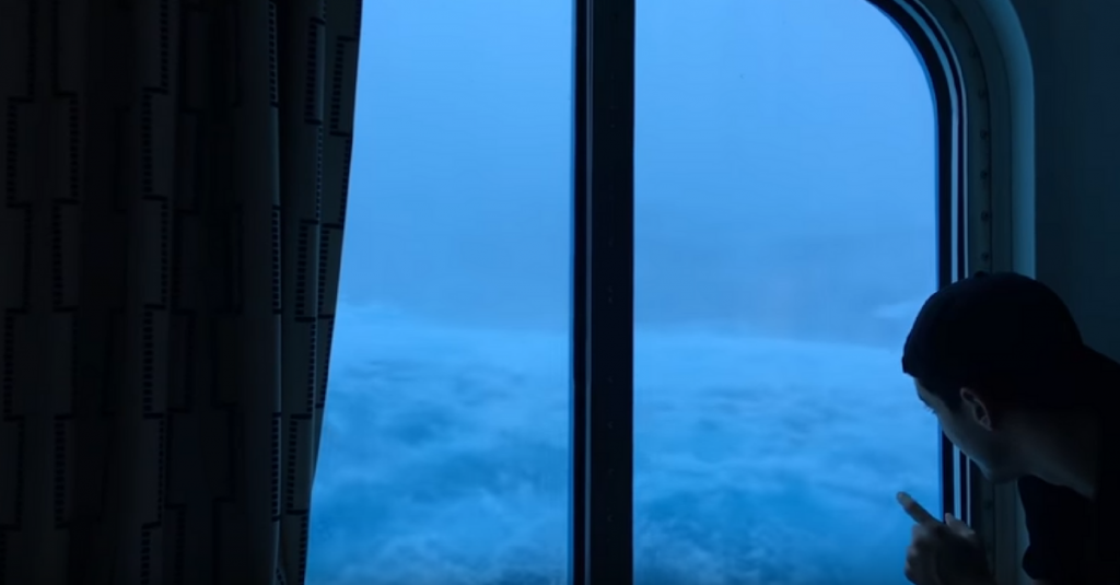 Raw footage of giant waves crashing into a cruise ship while this guy looks outside hoping not to die 1