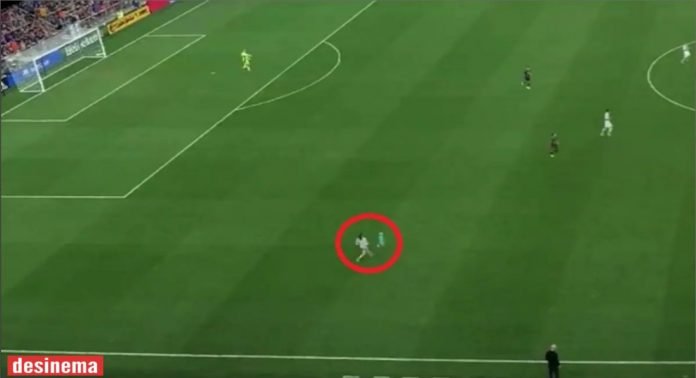 Two-year-old kid runs onto soccer pitch during match, mom tackles him in seconds