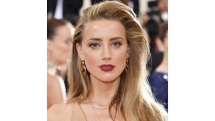 Amber-lashes-out-a-social-media-but-says-Depp-is-a-beloved-character